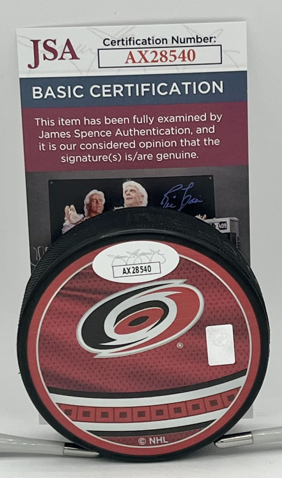 Dmitry Orlov signed Carolina Hurricanes Reverse Retro Puck autographed JSA