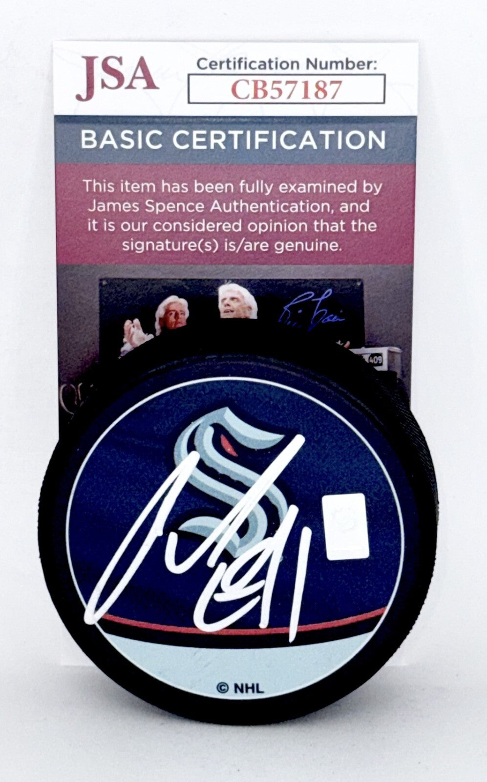 Ryker Evans signed Seattle Kraken Reverse Retro Puck autographed JSA