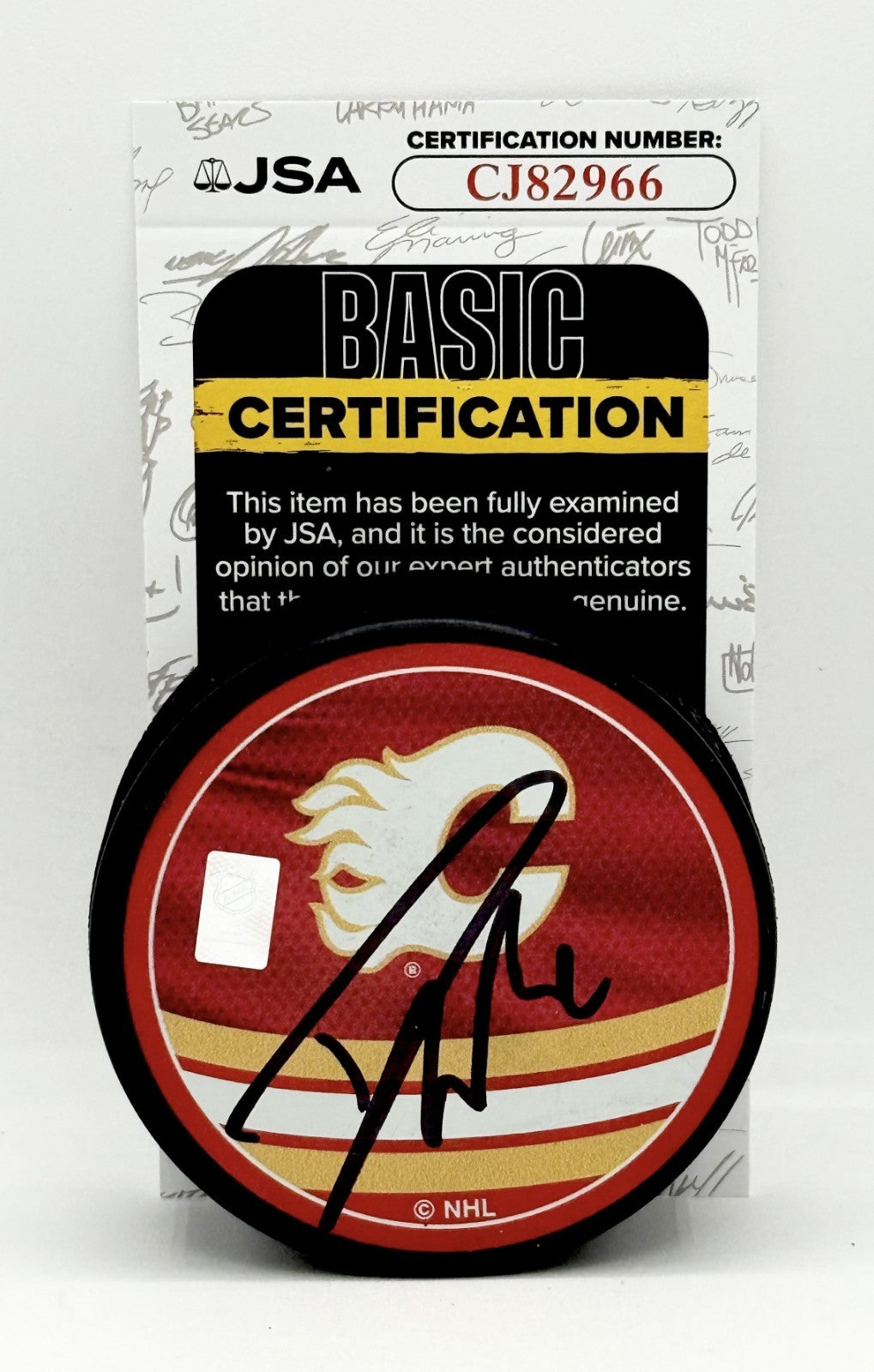 Dustin Wolf signed Calgary Flames Reverse Retro Puck autographed JSA