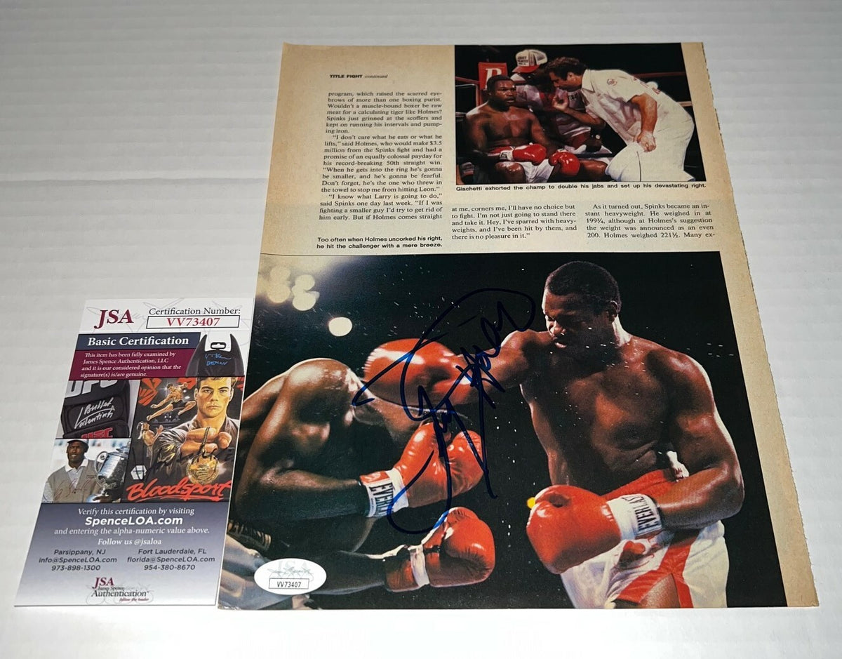 Larry Holmes Heavyweight Champ signed Boxing Magazine Page autographed 10 JSA