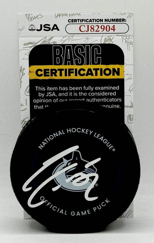 Adam Foote signed Vancouver Canucks Official Game Puck autographed JSA
