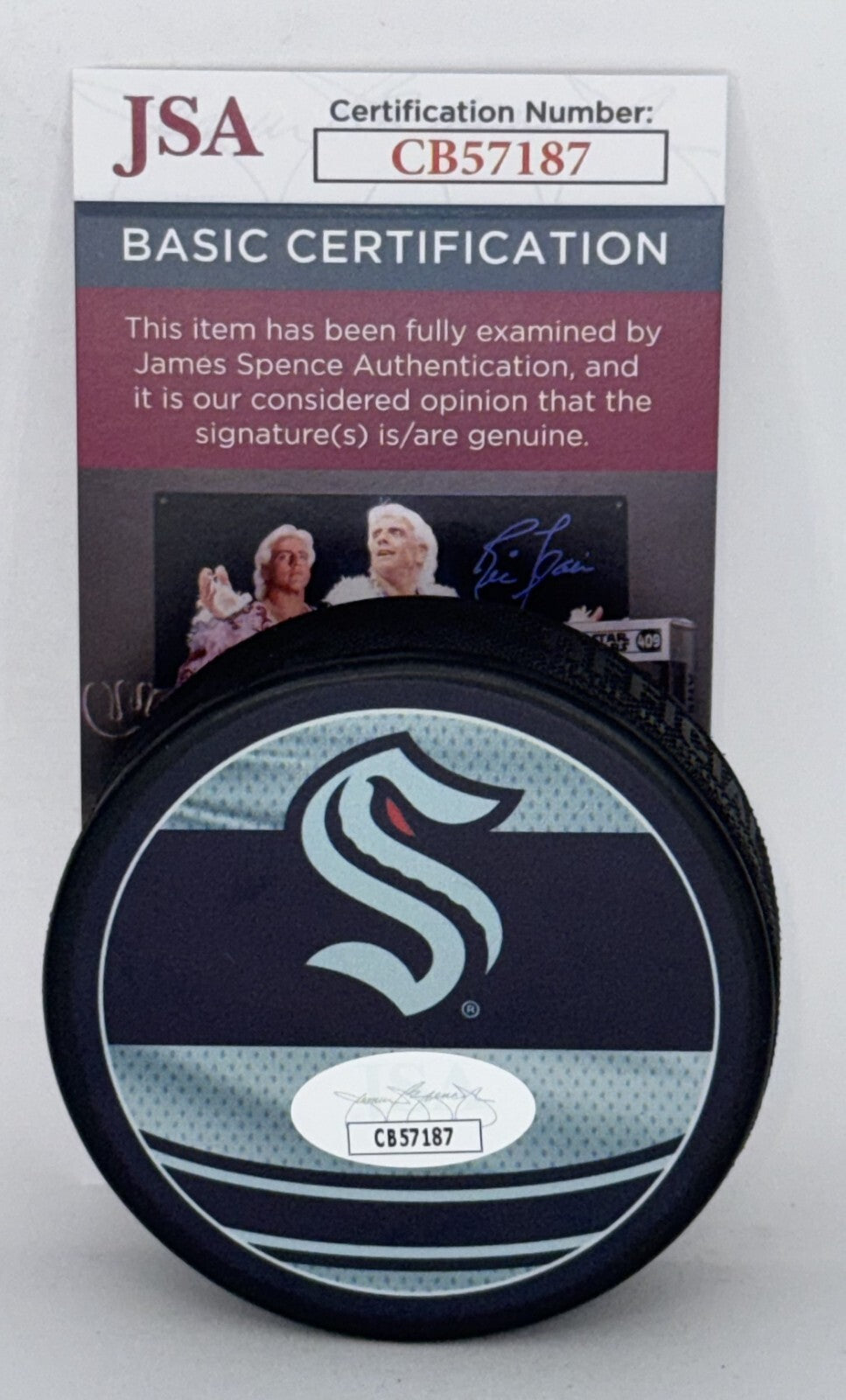Ryker Evans signed Seattle Kraken Reverse Retro Puck autographed JSA