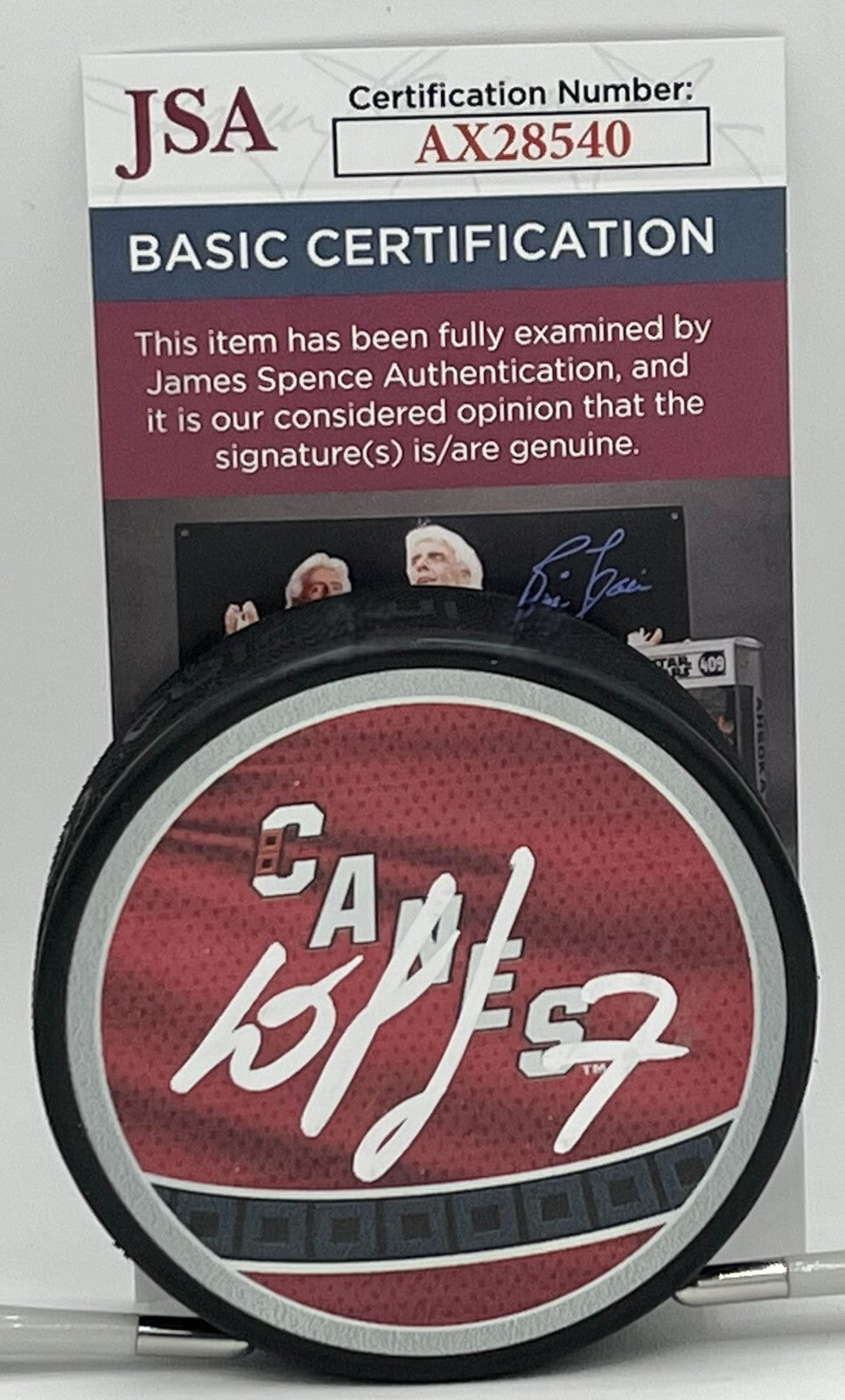 Dmitry Orlov signed Carolina Hurricanes Reverse Retro Puck autographed JSA